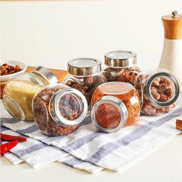 Irregular-shaped glass spice jars in various sizes, made of premium materials for stylish and functional kitchen storage