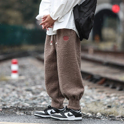 Men's Retro Style Loose Casual Trousers in a variety of colours, including milky white, brown, and black