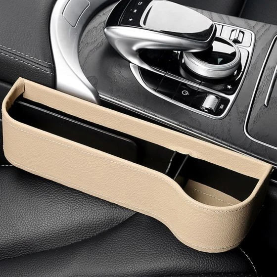 Premium multifunctional car seat organiser with various compartments for storing phones, chargers, pens, and other car essentials
