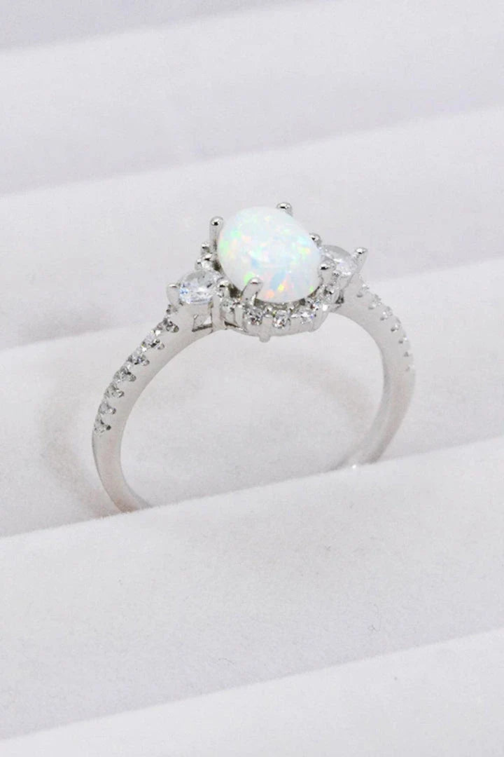 A stunning platinum-plated opal ring made from 925 sterling silver, featuring a modern and minimalist design
