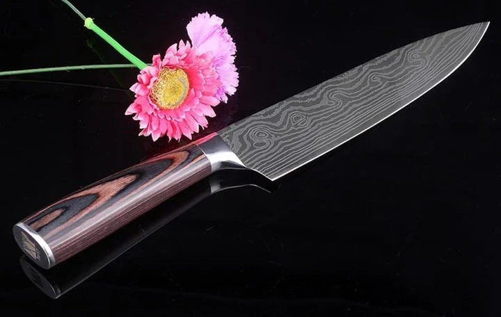 A set of three Japanese-style chef knives with stainless steel blades and ergonomic handles, perfect for slicing, dicing, and mincing in the kitchen.