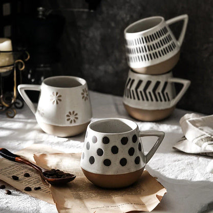 A hand-painted ceramic mug featuring a unique Nordic-inspired design, perfect for enjoying coffee, tea, or other beverages