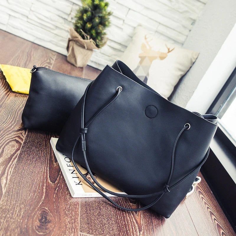 Stylish shoulder bag for modern mothers in the UK, featuring a premium PU leather design and versatile interior organisation