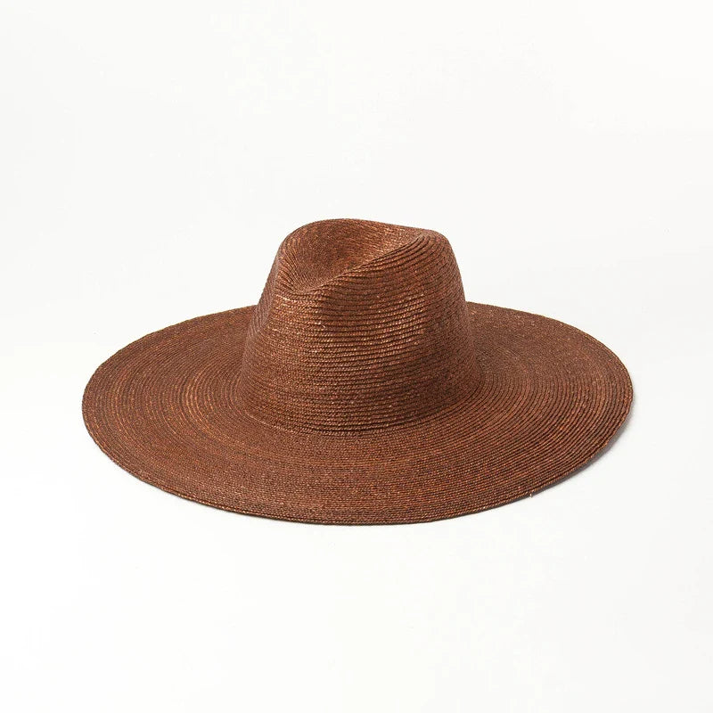 Premium outdoor sun protection straw hat in black, brown, and pinkish colours with a large brim and tie-dye pattern