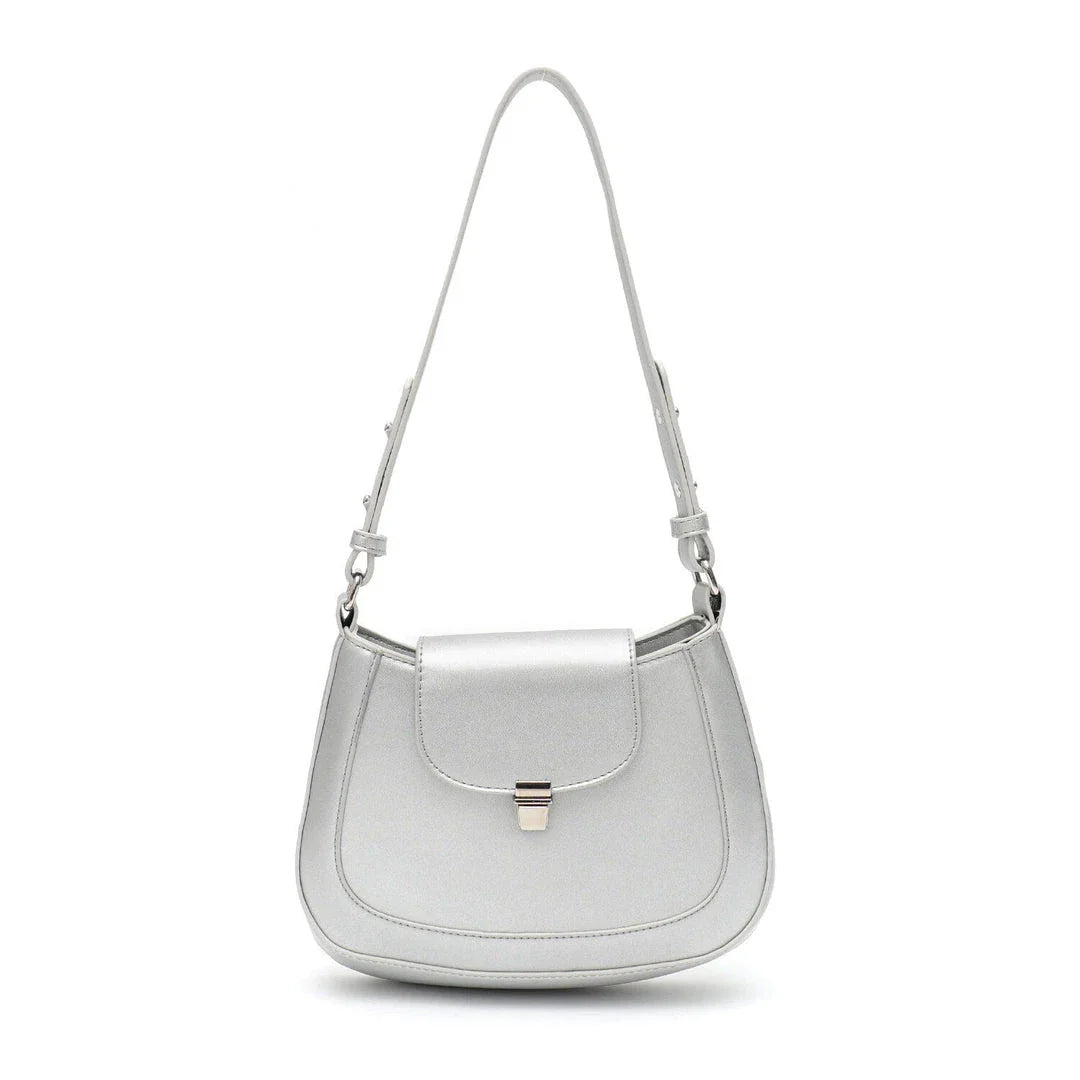 Elegant and versatile vegan leather shoulder bag with adjustable strap, flap cover, and interior pockets for modern British women