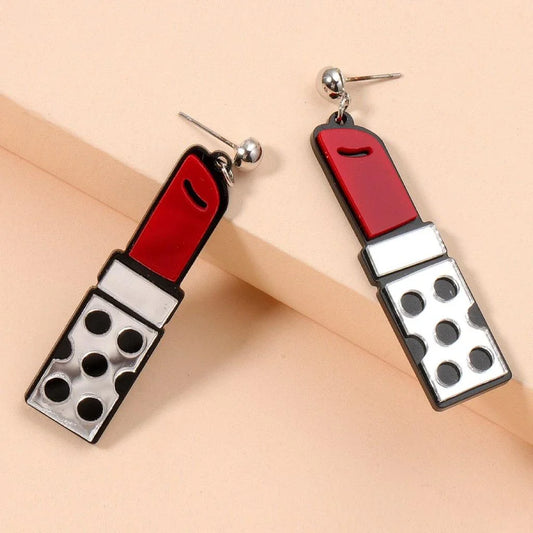 Trendha Red Lipstick Earrings: Striking resin earrings in a bold lipstick design, perfect for adding a touch of modern flair to any outfit.