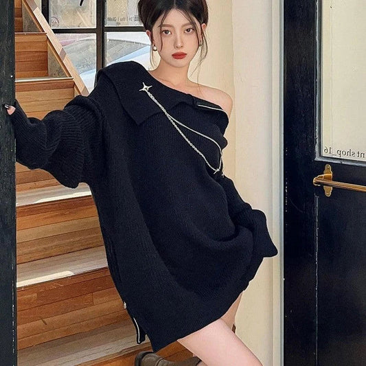 Luxurious off-the-shoulder zipper sweater in black and beige, featuring lantern sleeves and a cozy alpaca wool blend
