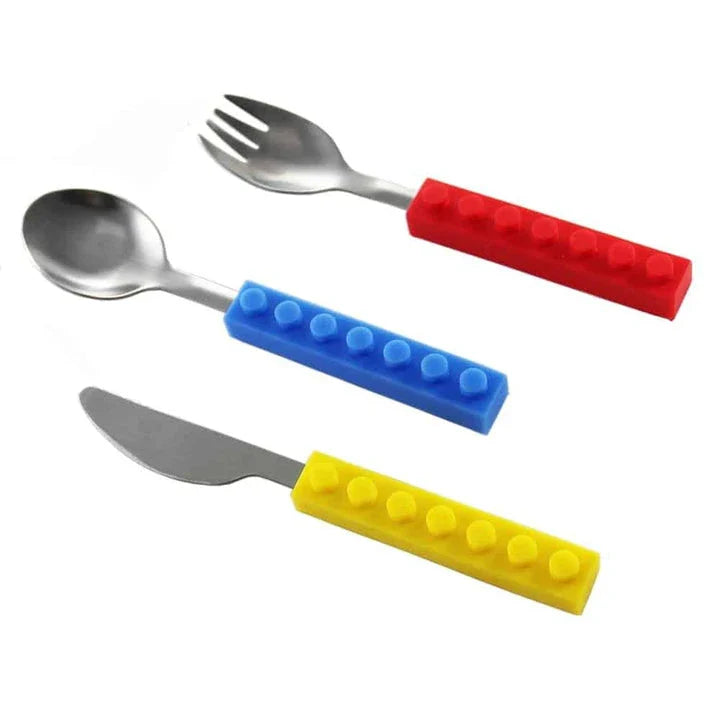 A colourful cutlery set with a decorative brick pattern, made of durable metal and featuring a knife, fork, and spoon.