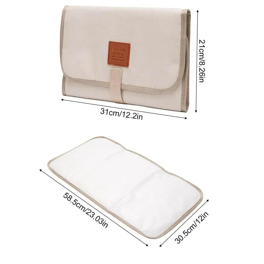 Premium waterproof changing pad for babies, featuring a compact, foldable design and soft, skin-friendly materials for a comfortable, hygienic nappy changing experience on the go.