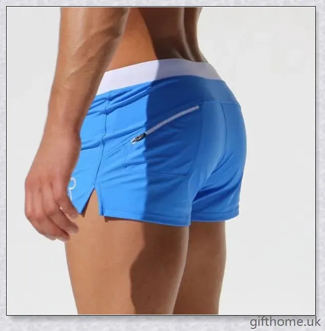 Premium low-waisted swimming trunks in a range of stylish colours, featuring a classic and flattering design for the discerning British swimmer.