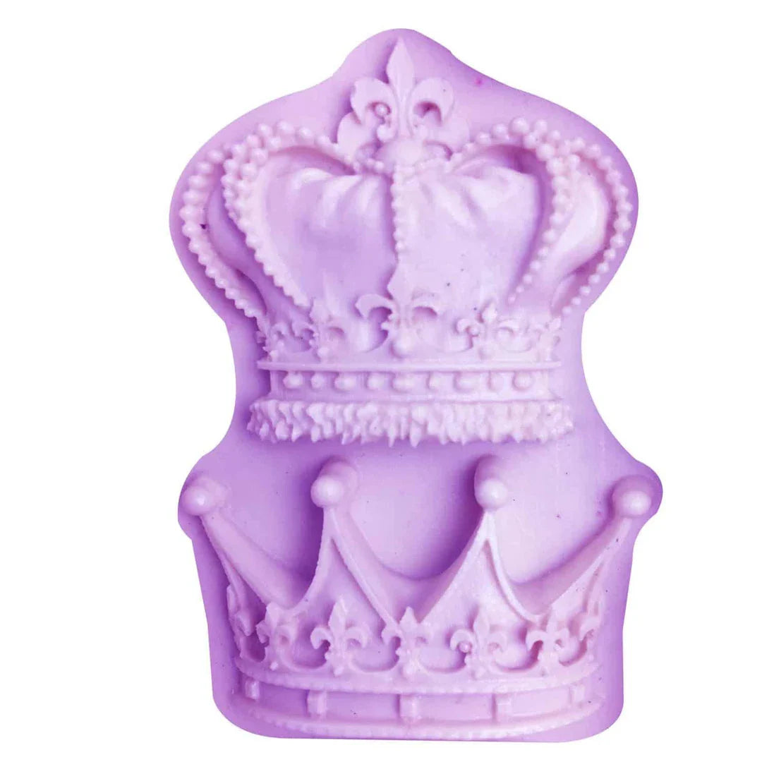 Elegant crown-shaped silicone fondant mould in vibrant pink colour for creating regal-inspired baked goods