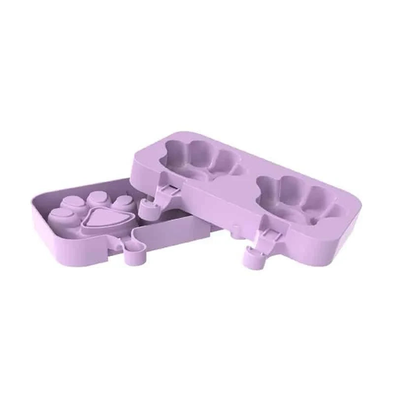 Purple silicone popsicle mould with stainless steel sticks, perfect for creating homemade frozen treats with a British flair