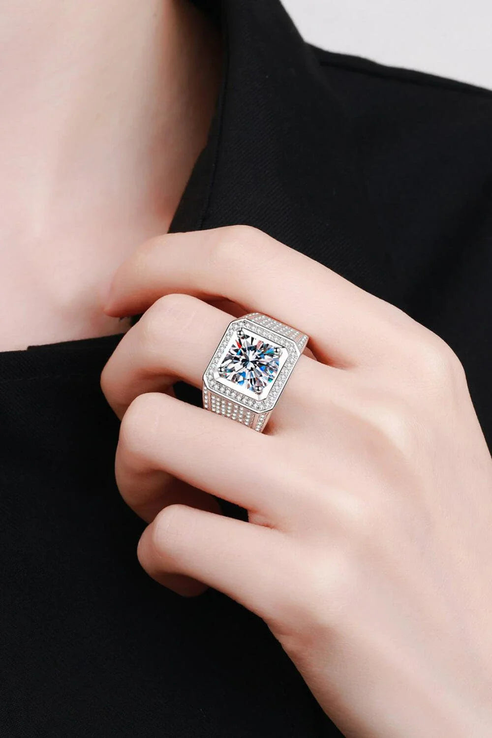 Elegant 925 sterling silver ring featuring a mesmerizing moissanite centre stone and delicate zircon accent stones