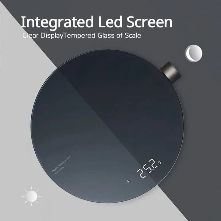 A sleek, stainless steel digital kitchen scale with a vibrant LED display, showcasing precise weighing capabilities up to 5 kilograms.