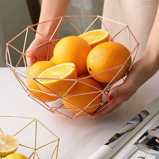 Elegant wrought iron storage basket with intricate design, perfect for home decor and versatile storage solutions