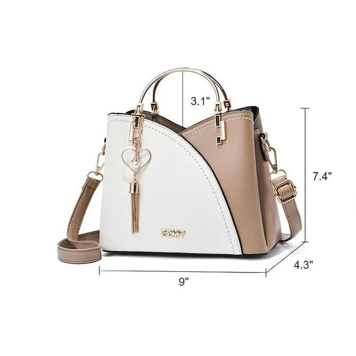 Sophisticated navy blue PU leather bucket crossbody bag with elegant patchwork design and adjustable strap
