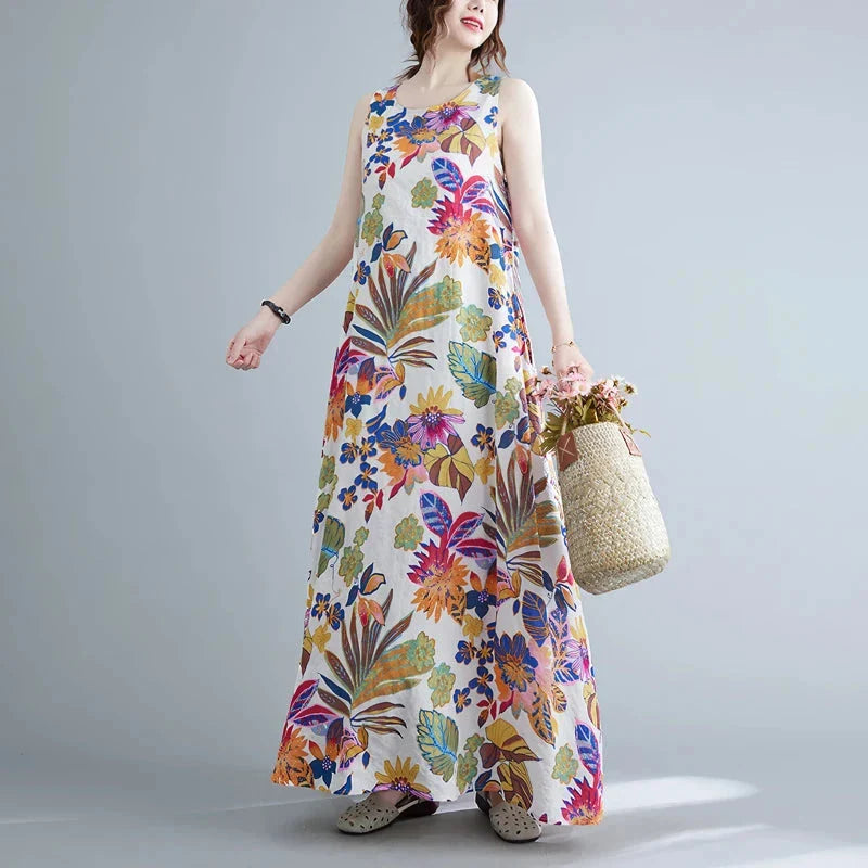 Elegant floral print cotton linen maxi dress in blue, perfect for warm weather wear