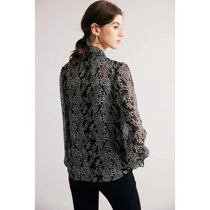 Elegant black silk blouse with unique bow collar, designed for a flattering fit and all-day comfort.