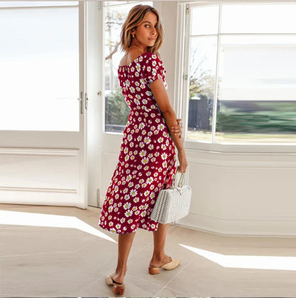 Elegant floral square collar dress with cinched hem, available in navy blue, green, and red colours