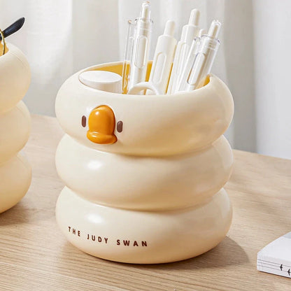 Stylish cartoon desk organiser with spacious circular design and cute cartoon motif for storing pens, pencils, and other desk essentials