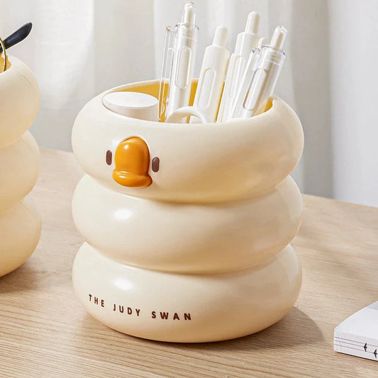 Stylish cartoon desk organiser with spacious circular design and cute cartoon motif for storing pens, pencils, and other desk essentials