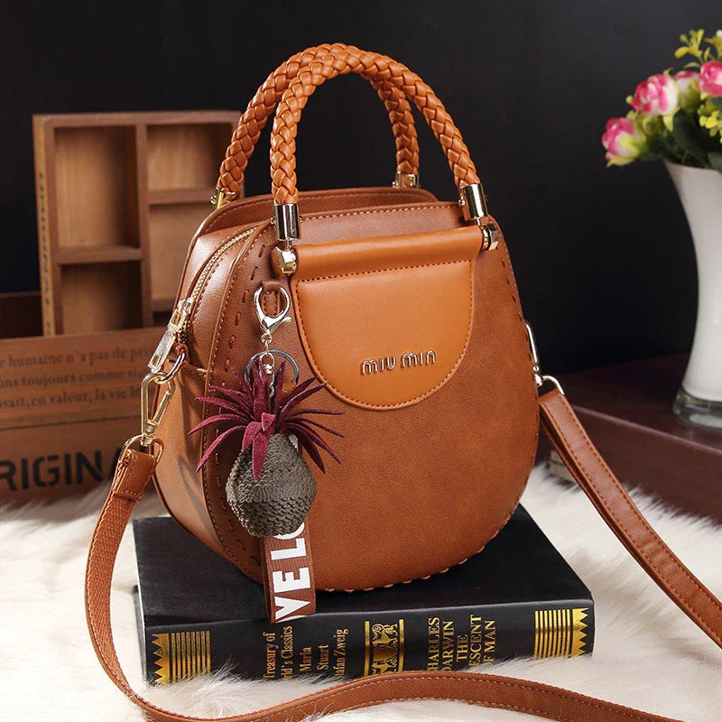 Fashionable women's one-shoulder diagonal bag in caramel, nude pink, black, wine red, and retro brown colours