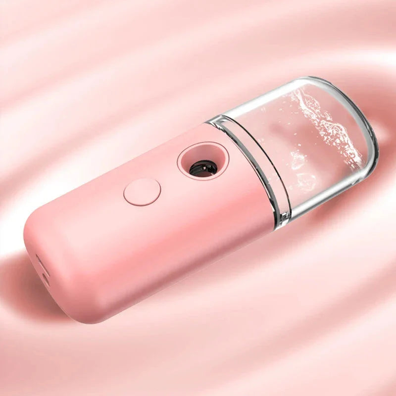Compact USB Powered Nano Facial Mist Sprayer in pink colour for deep hydration and a radiant glow