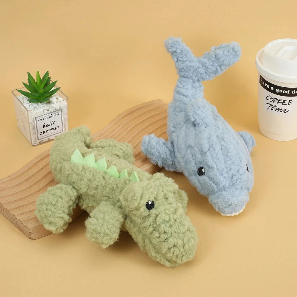 Plush crocodile-shaped squeaky dog toy made of durable, bite-resistant fleece material