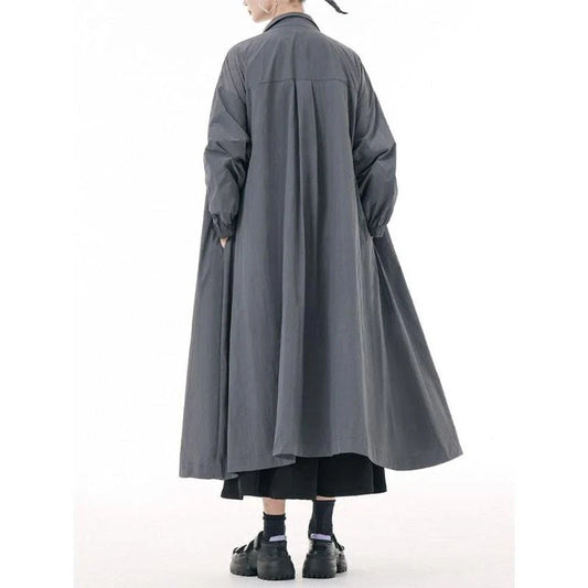Stylish army green trench coat with mandarin collar, zipper closure, and functional pockets for practical and fashionable all-season wear.