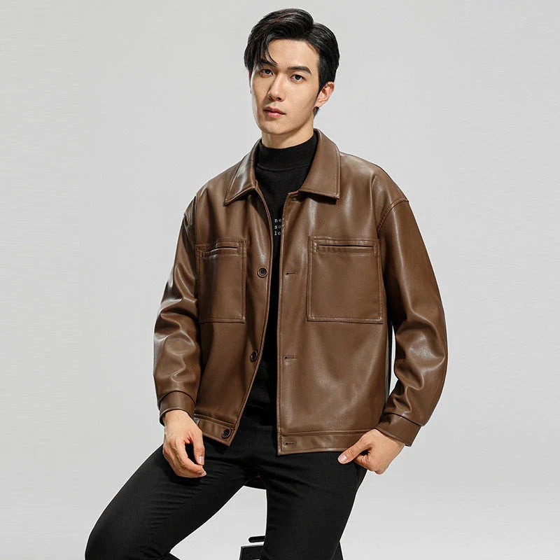 Handsome men's leather motorcycle jacket with lapel collar, dimensional pockets, and durable PU leather construction