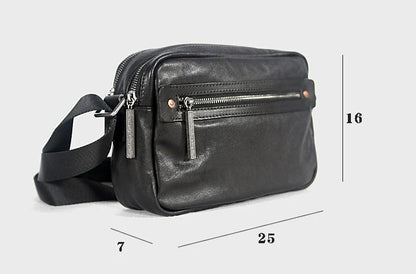 A premium British leather shoulder bag with a sleek, minimalist design and adjustable strap