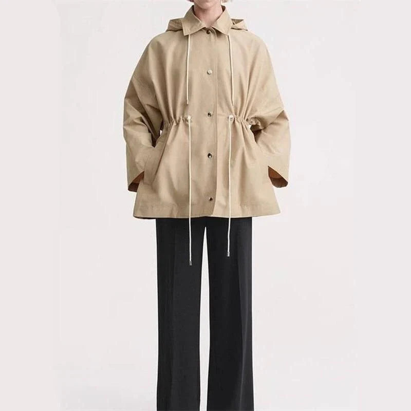 Elegant hooded trench coat in solid colour for middle-aged women, with adjustable drawstring waist and single-breasted closure