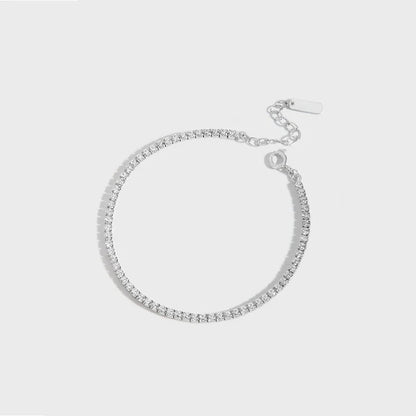 Sparkling silver geometric bracelet with adjustable clasp and intricate patterns