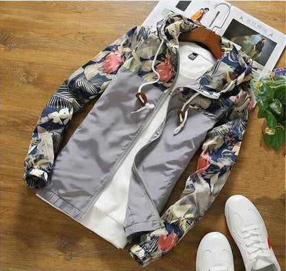 Men's slim-fit hooded jacket with camouflage print, zippered pocket, and premium chemical fibre blend fabric