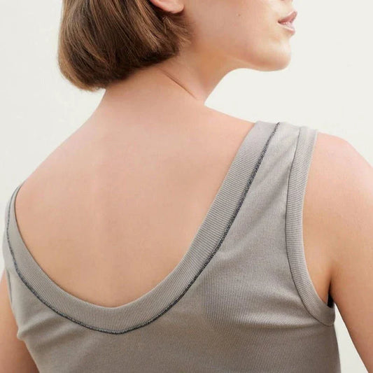 100% wool sleeveless knit vest with delicate beading, available in white colour and multiple sizes