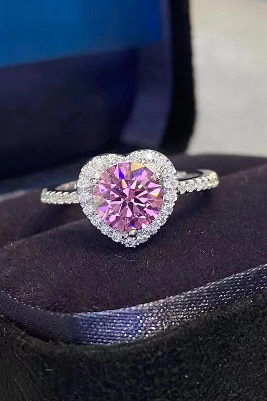Elegant platinum-plated 925 sterling silver ring featuring a captivating 1 carat moissanite heart-shaped centre stone and sparkling zircon accents.