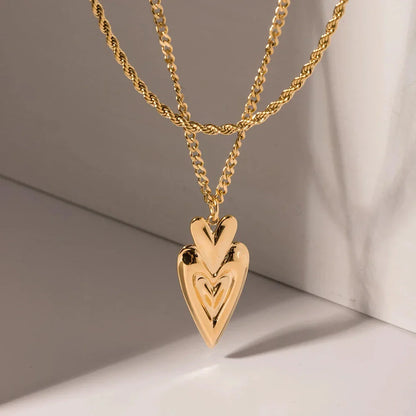 Elegant 18-carat gold-plated heart necklace with a semi-3D pendant and double-layer chain design
