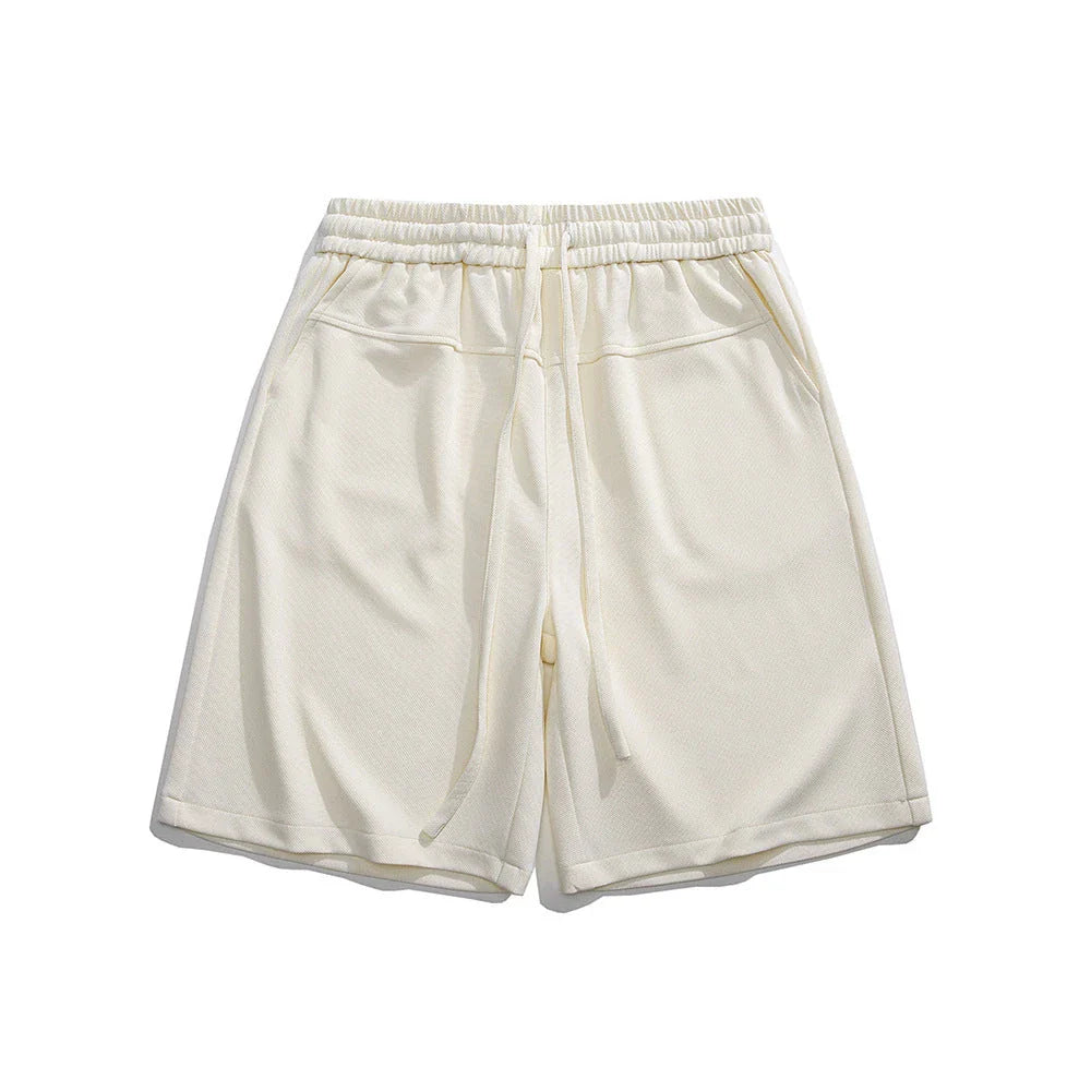 Premium straight-fit drawstring trousers in white, khaki, and black colours for stylish British men