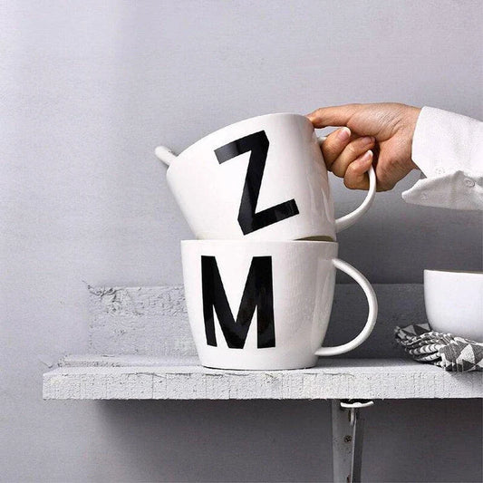 Premium personalised ceramic mug with initial design, offering a stylish and functional solution for daily beverages