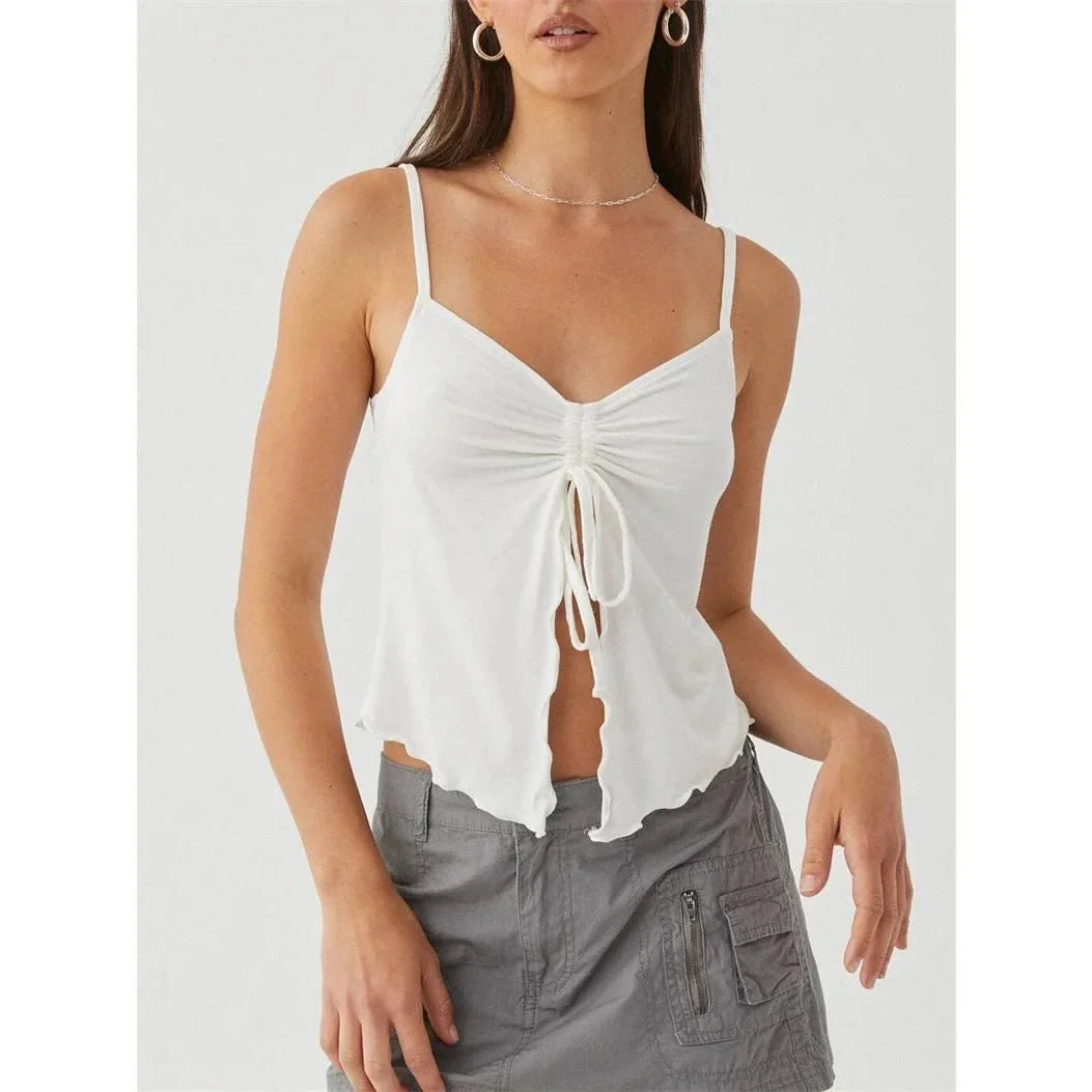 Chic white sleeveless crop top with side bandage detail, perfect for summer fashion