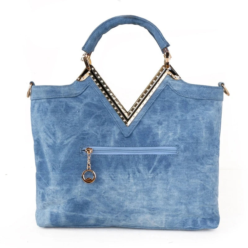 Light blue denim crossbody bag with sparkling diamond-inspired detailing from Trendha