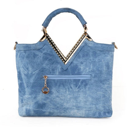 Light blue denim crossbody bag with sparkling diamond-inspired detailing from Trendha