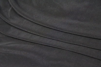 Elegant puff sleeve mesh dress with a flattering short, irregular skirt in white and black colours
