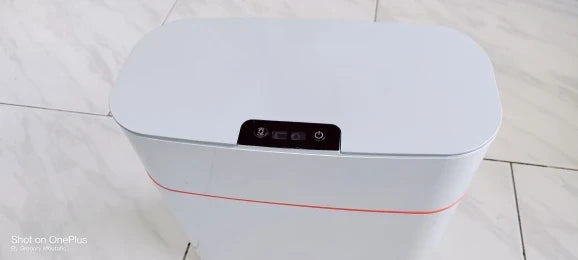 Sensor-powered bin with sleek design and touch-free motion-activated lid for effortless, hygienic waste disposal