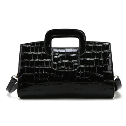 A stylish and versatile retro-patterned handbag with a sturdy canvas construction and organised interior, perfect for everyday use in the UK.