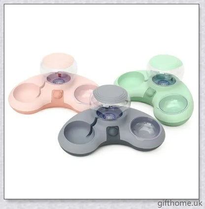 Automatic pet feeding and drinking bowl with crescent-shaped design, available in grey, powder, and green colours