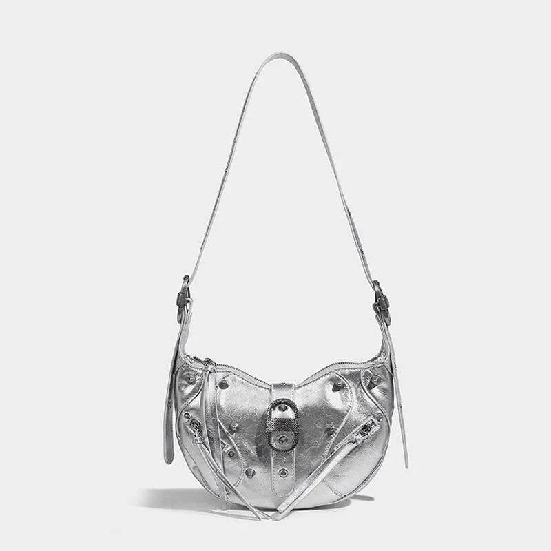 Stylish pink leather sling crossbody daypack with adjustable strap and smooth zipper closure