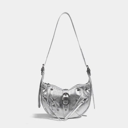 Stylish pink leather sling crossbody daypack with adjustable strap and smooth zipper closure