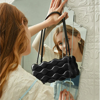 Premium embossed pearl chain handbag in fashionable shades with a soft, comfortable handle for hands-free carrying