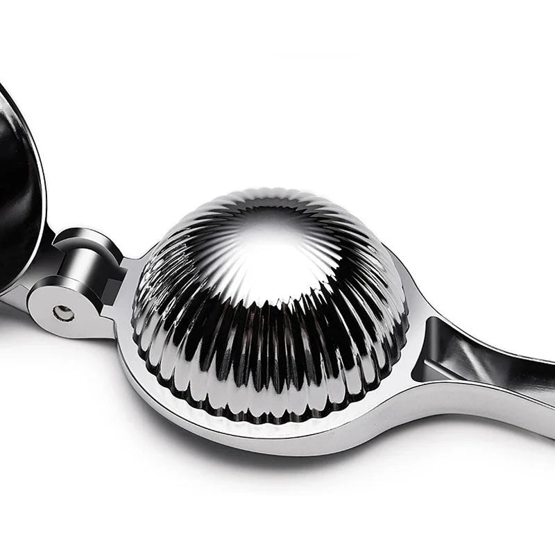 A high-quality manual lemon squeezer made of stainless steel for extracting fresh citrus juice